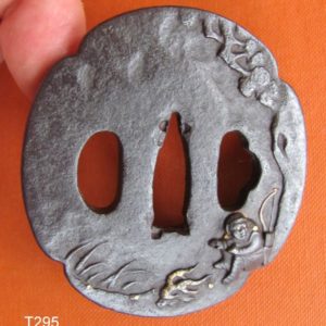 T295. Iron tsuba with Night Watchman. Ex Holbrook