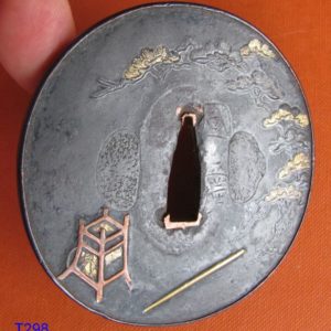 T298. Iron Tsuba with Shakudo Fukurin signed Kunihiro