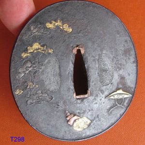 T298. Iron Tsuba with Shakudo Fukurin signed Kunihiro