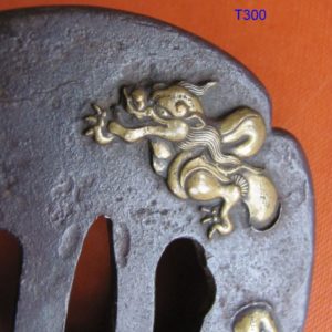 T300. Iron Tsuba with Great Brass Dragon