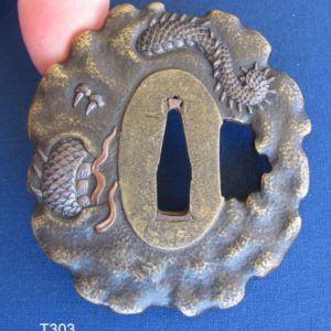 T303. Brass Tsuba Finely Carved Dragon