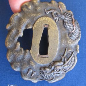 T303. Brass Tsuba Finely Carved Dragon