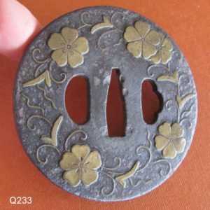 Q233. Large Iron Tsuba with Extensive Brass Inlay