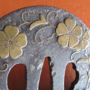 Q233. Large Iron Tsuba with Extensive Brass Inlay