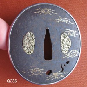 Q235. Iron Tsuba with Gold Zogan and Silver Fukurin