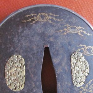 Q235. Iron Tsuba with Gold Zogan and Silver Fukurin