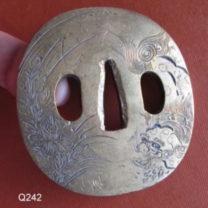 Q242. Carved Tsuba Covered in Gold