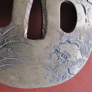 Q242. Carved Tsuba Covered in Gold