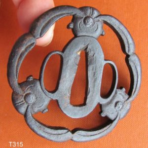 T315. Iron Sukashi Tsuba of Long Eared Rabbits