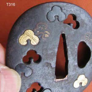 T316. Iron Tsuba with Gold, Shakudo, & Copper Suhama