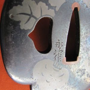 T314. Iron Tsuba with Sahari Inlay