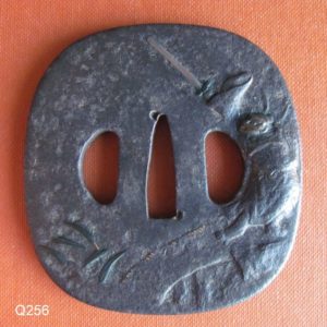 Q256. Large Iron Tsuba, Man with Ken