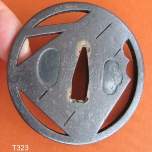 T323. Papered Inshu Suruga Tsuba