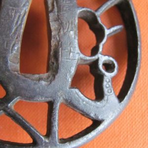 T153. Iron Sukashi Tsuba. Musashino.