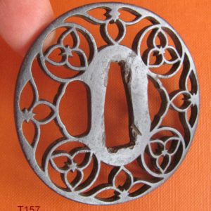 T157. Iron sukashi tsuba, Higo