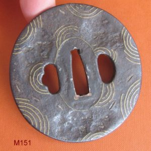 M151. Iron and brass tsuba