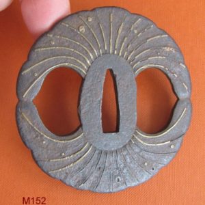 M152. Iron and brass tsuba