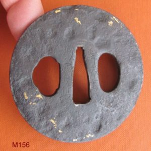 M156. Iron tsuba with small sections of gold