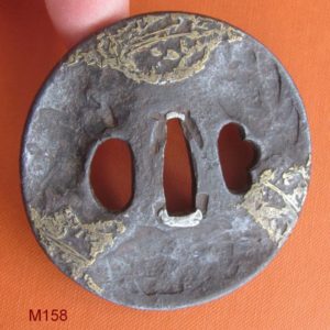 M158. Iron and brass tsuba