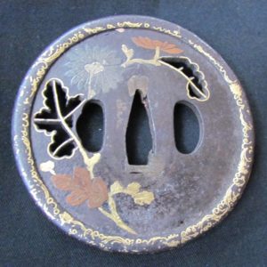 M238. Iron Sukashi Tsuba with Extensive Inlay, Kenjo