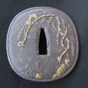 M242. Large Iron Tsuba with Unusual Inlay