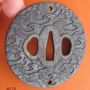 M176. Iron tsuba with gold nunome