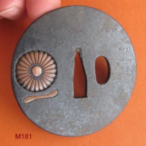 M181. Iron sukashi tsuba with filled sukashi