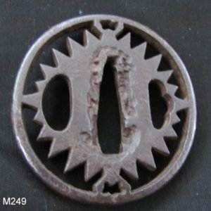 M249. Papered Iron Tokei Tsuba