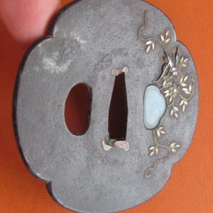 M184. Iron tsuba with soft metal