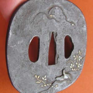 M187. Iron tsuba with soft metal extras