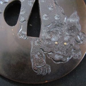 M227. Shakudo Tsuba with Shishi