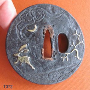 T372. Iron Tsuba, Rabbits on Waves