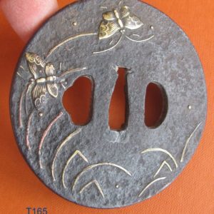 T165. Iron tsuba with soft metal butterflies