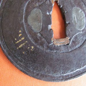 T394. Iron Tsuba with Gold Nunome