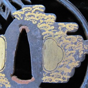 Q298. Iron Sukashi Tsuba with Extensive Gold Inlay