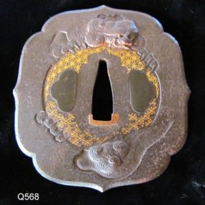 Q568. Papered Tsuba by Ichiryuken Naotoshi