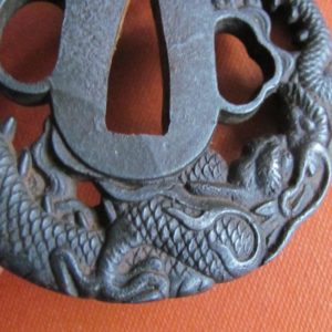 K120. Iron Sukashi Tsuba of a Dragon