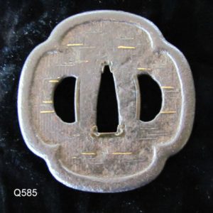 Q585. Iron Tsuba with Unusual Surface Treatment