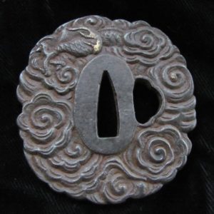 Q630. Iron Tsuba Overrun with Dragon