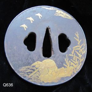 Q636. Iron Tsuba with Extensive Gold Inlay