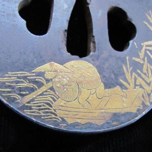Q636. Iron Tsuba with Extensive Gold Inlay