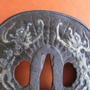 T420. Iron Tsuba with Gold Dragons