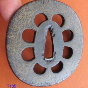 T185. Iron sukashi with brass inlay tsuba