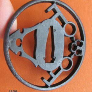 J105. Iron Sukashi Tsuba. Akasaka