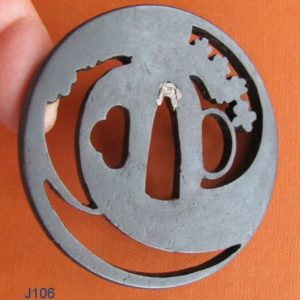 J106. Iron Sukashi Tsuba with paper. Akao