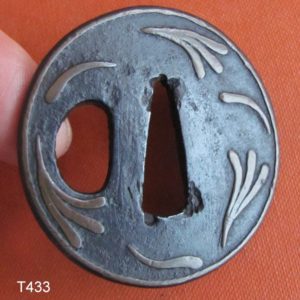 T433. Iron Tanto Tsuba with Copper Inlay