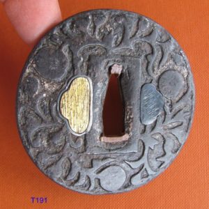 T191. Namban Tsuba with added Japanese Plate