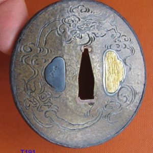 T191. Namban Tsuba with added Japanese Plate