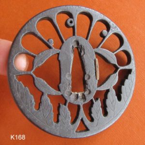 K168. Iron Sukashi Tsuba, Owari with Paper