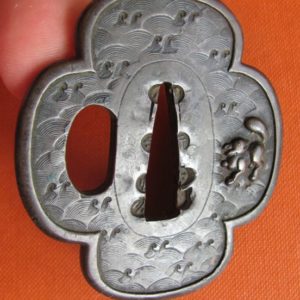 T196. Ko Kinko Tsuba. Fox on waves.